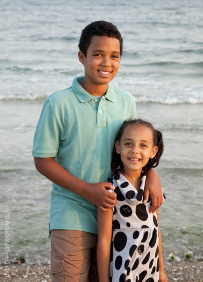Brother and Sister in front of ocean