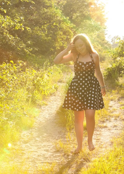 portrait of teen with lens flare from sun