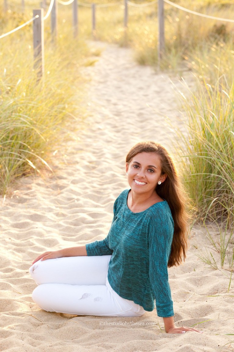 girl sitting on beach path