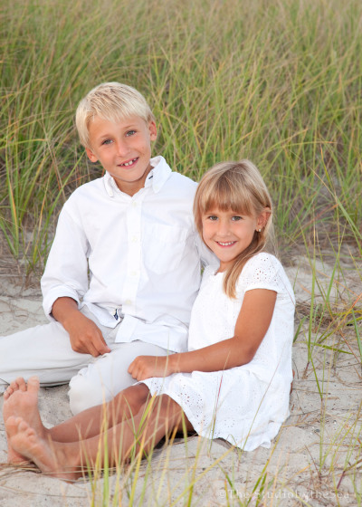Brother and sister on the beach portrait