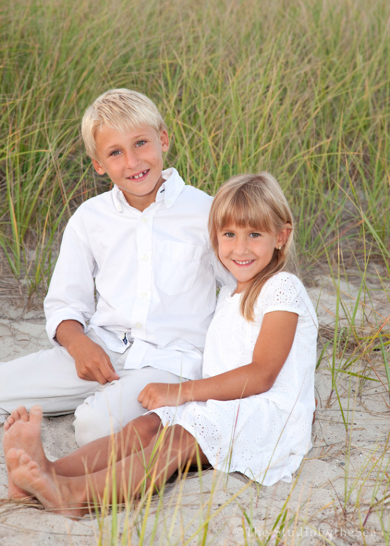 Brother and sister on the beach portrait