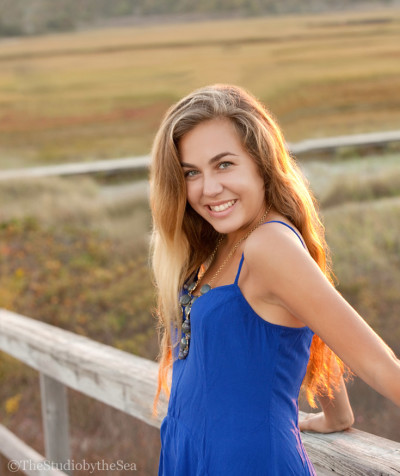 Teen girl on boardwalk