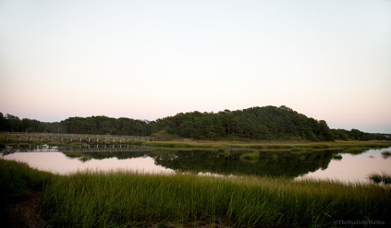 boardwalk and marsh at sunset
