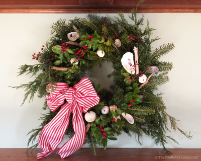 wreath with beach finds and red boy