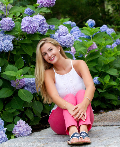 Senior girl in front of Hydrangeas