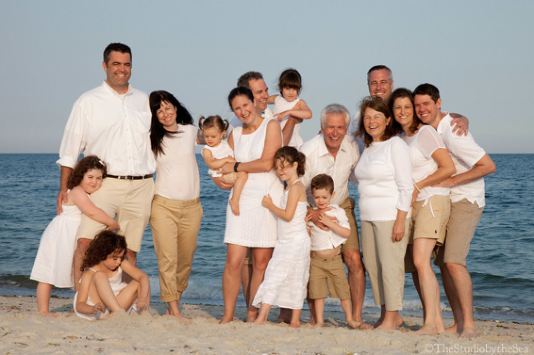 large casual family portrait on beach