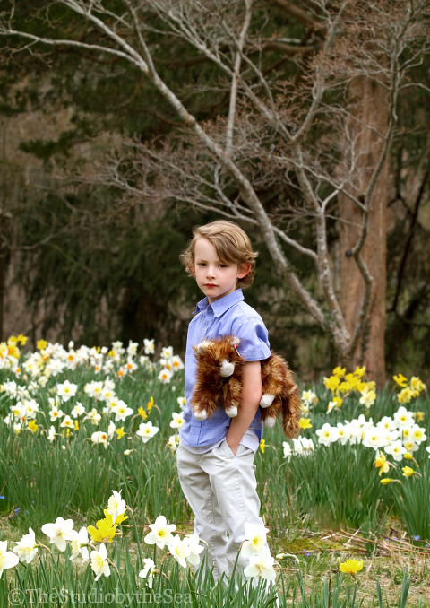 Boy-with-his-cat-standing